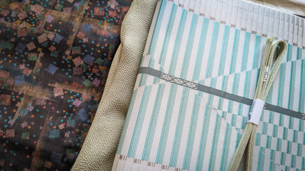 Dark brown kimono and white/turquoise obi